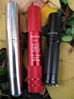 Group: Trusfire XP-E F23, Black Cat HM-01, and iTP A3 EOS